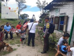 Wujudkan Balita Yang Sehat, Bripka S Nasution Dampingi Nakes Cek Kesehatan Warganya