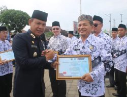 Pj. Bupati Fauzan Menjadi Irup Upacara Peringatan Hari KORPRI ke-52, PGRI ke-78 dan HGN