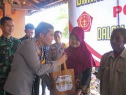 Polres Nganjuk bersama  Kodim 0810/Nganjuk Gelar Bansos dan Pengobatan Gratis bagi Warga Desa Sidokare
