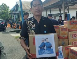 Hidayat Muhammad dan Keluarga Kirim Bantuan Tanggap Bencana Yang di Terima Langsung Oleh Kepala Desa Seguring Kecil